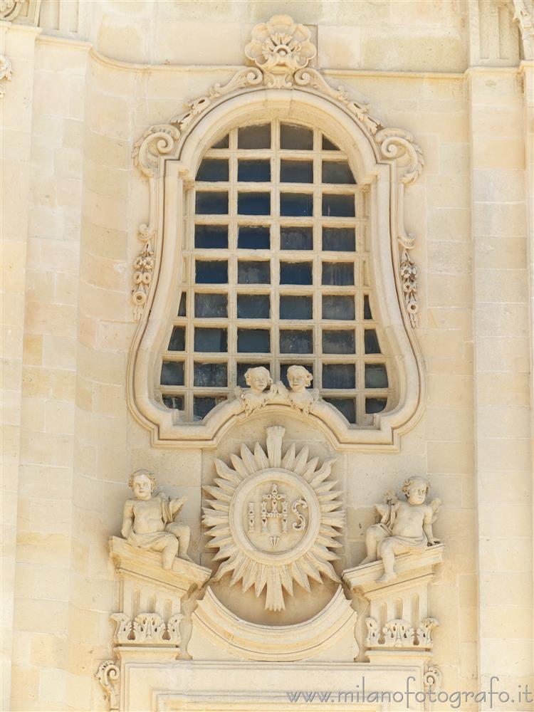 Uggiano La Chiesa (Lecce, Italy) - Baroque decorations above one side entrance of the Church of Santa Maria Maddalena